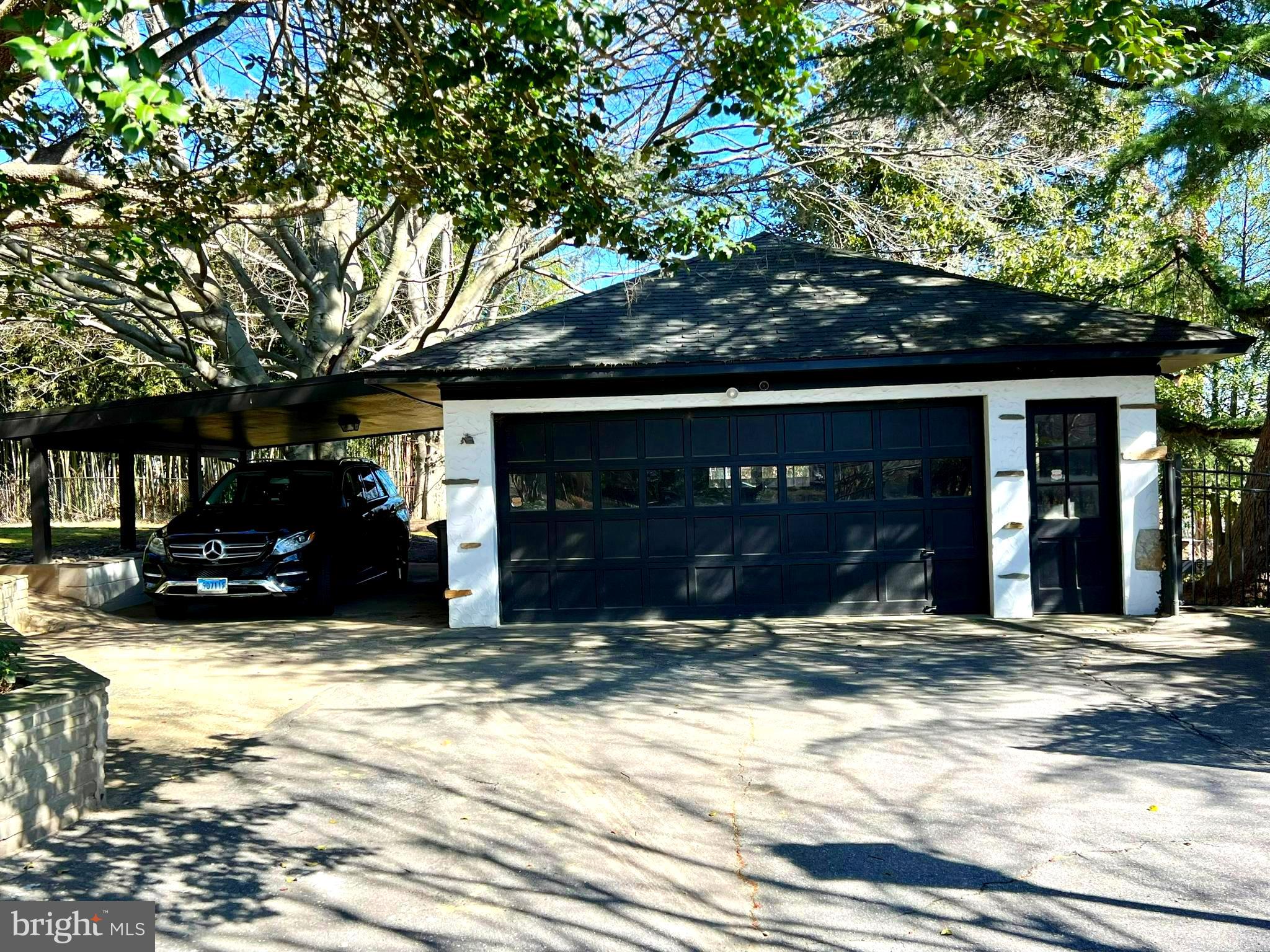 9218 Colesville Road Silver Spring, MD 20910 - Photo 52 of 76 Detached two car garage and carport