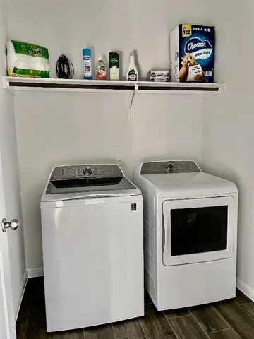 a utility room with dryer and washer