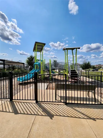 a view of a balcony with sitting area