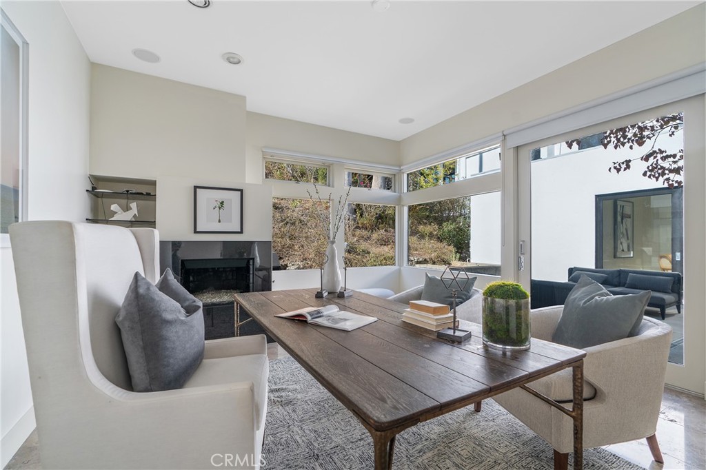 1436 Summitridge Drive Beverly Hills, CA 90210 - Photo 15 of 28 a view of a dining room with furniture window and outside view