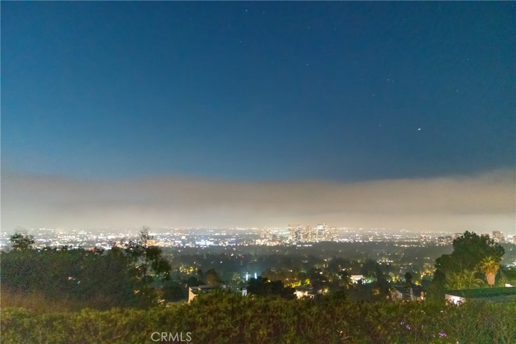 1436 Summitridge Drive Beverly Hills, CA 90210 - Photo 28 of 28 a view of city and mountain