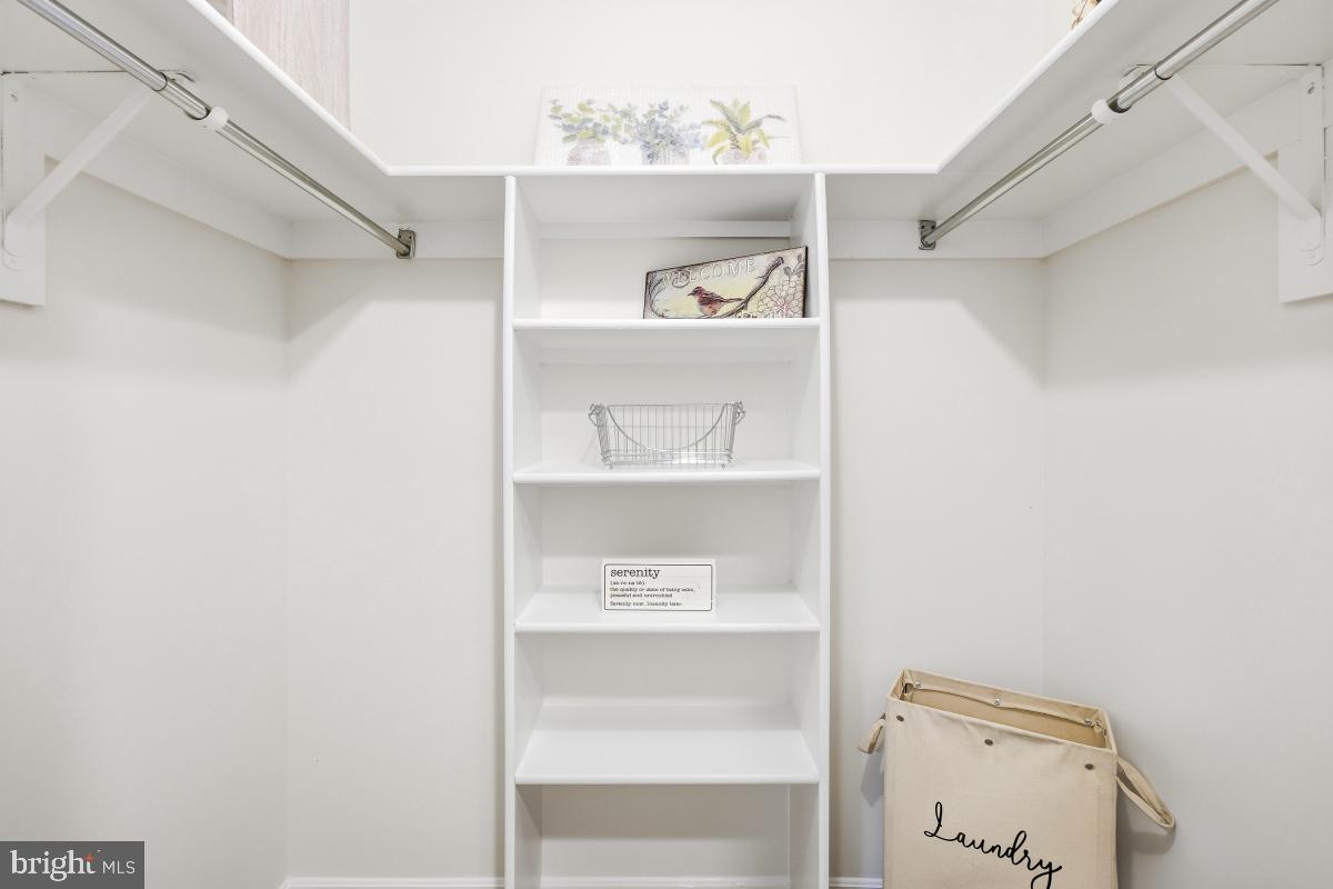 15107 Interlachen Drive, Unit 2215 Silver Spring, MD 20906 - Photo 14 of 31 a view of an empty walk in closet