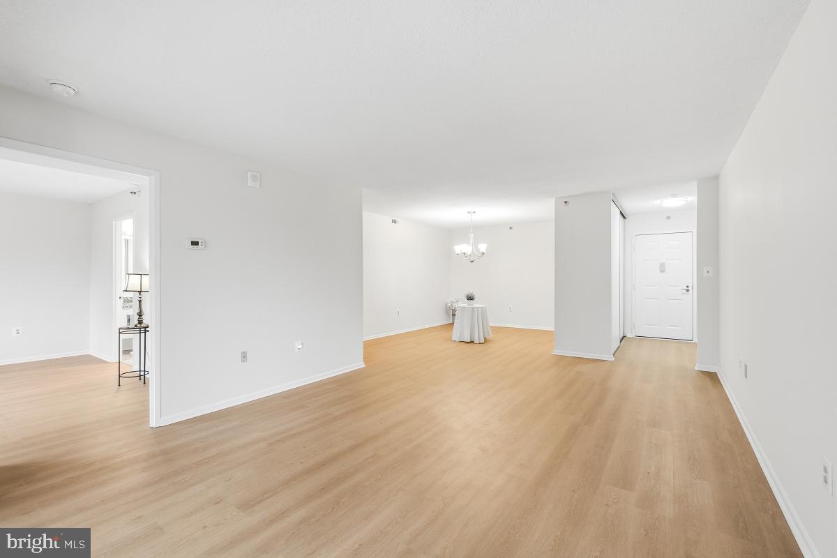 15107 Interlachen Drive, Unit 2215 Silver Spring, MD 20906 - Photo 31 of 31 a view of empty room with wooden floor