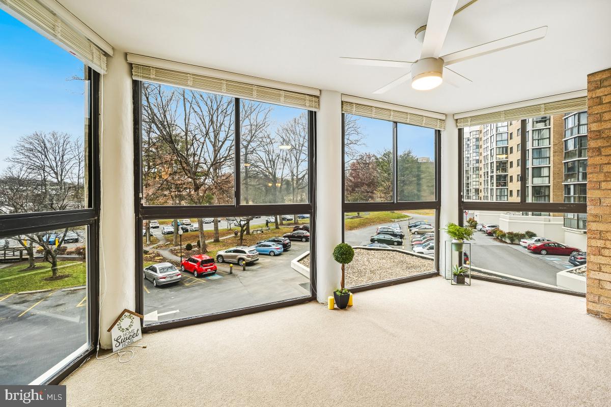 15107 Interlachen Drive, Unit 2215 Silver Spring, MD 20906 - Photo 21 of 31 a very nice looking room with a large window and stuff