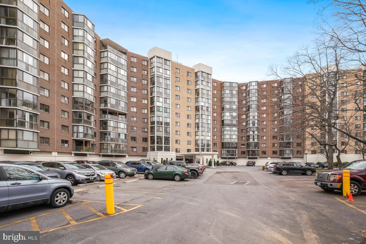 15107 Interlachen Drive, Unit 2215 Silver Spring, MD 20906 - Photo 28 of 31 a view of a street with cars