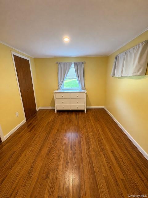 68 Whitford Road Westtown, NY 10998 - Photo 23 of 39 Spacious room featuring wood-finish flooring, a window offering natural illumination, and a built-in ceiling light