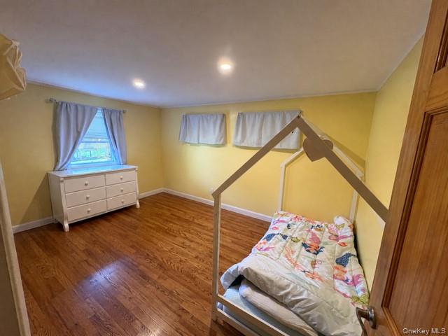 68 Whitford Road Westtown, NY 10998 - Photo 25 of 39 Room featuring wood-finish flooring, two windows, and recessed ceiling lighting