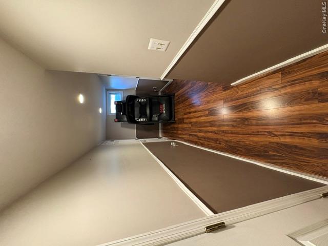 68 Whitford Road Westtown, NY 10998 - Photo 30 of 39 Hallway featuring wood-finish flooring, two-tone painted walls, white trim, and recessed lighting