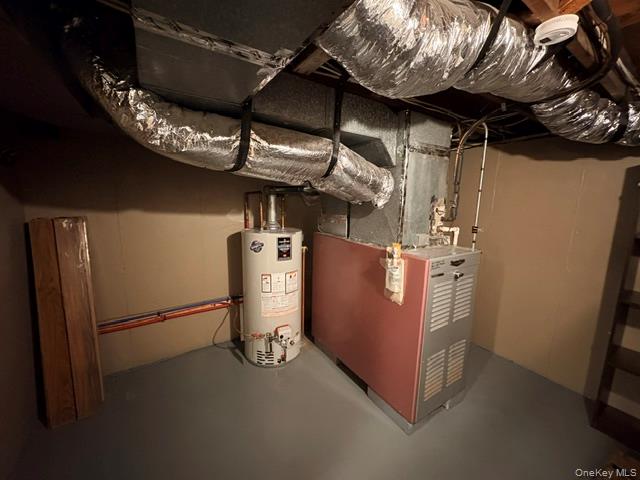 68 Whitford Road Westtown, NY 10998 - Photo 35 of 39 Utility area featuring a water heater, furnace, and exposed ductwork
