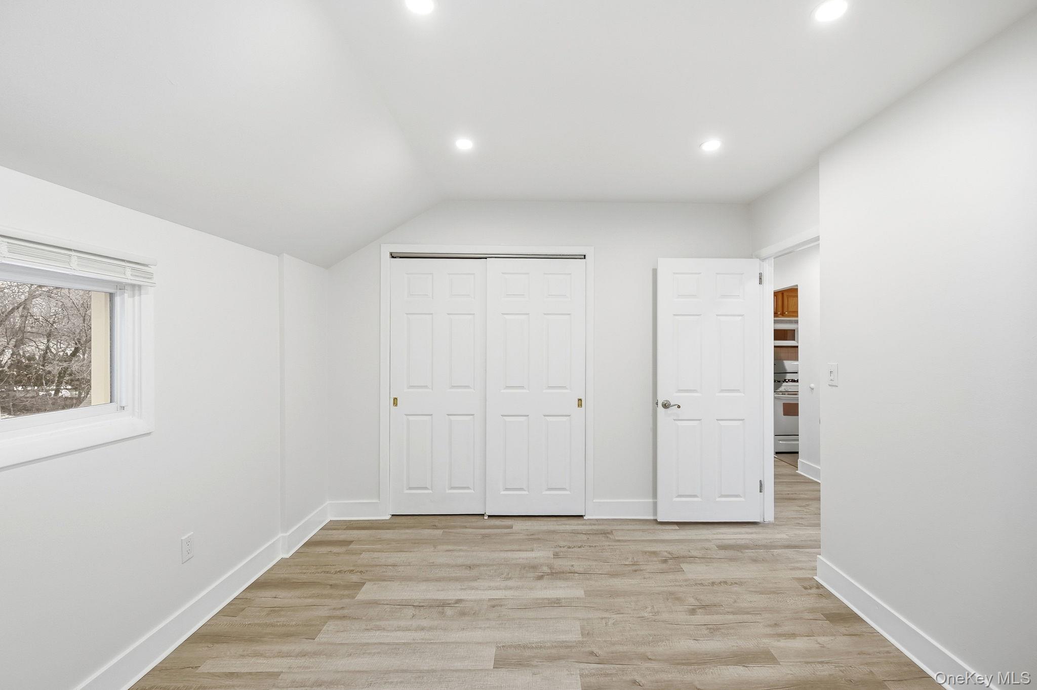 359 Orangeburg Road, Unit 2 Pearl River, NY 10965 - Photo 30 of 39 a view of an empty room with wooden floor