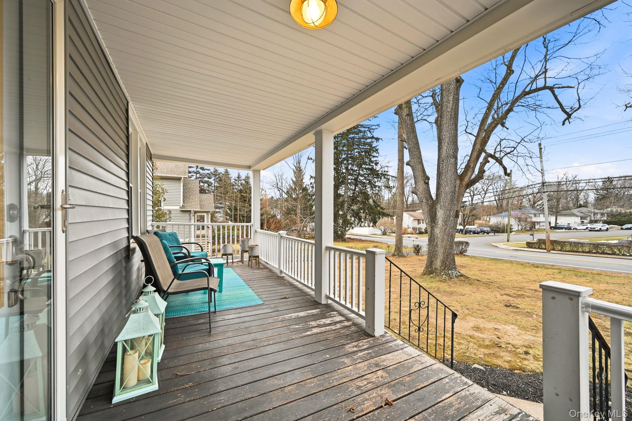 359 Orangeburg Road, Unit 2 Pearl River, NY 10965 - Photo 3 of 39 a view of a chair and tables in the balcony