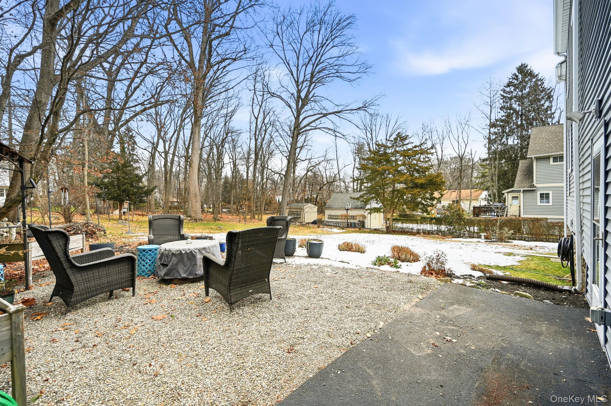 359 Orangeburg Road, Unit 2 Pearl River, NY 10965 - Photo 35 of 39 a view of a swimming pool with outdoor seating