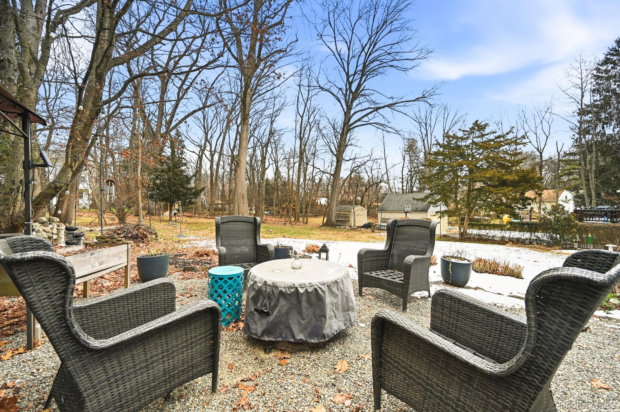 359 Orangeburg Road, Unit 2 Pearl River, NY 10965 - Photo 36 of 39 a outdoor living space with patio furniture and a fire pit