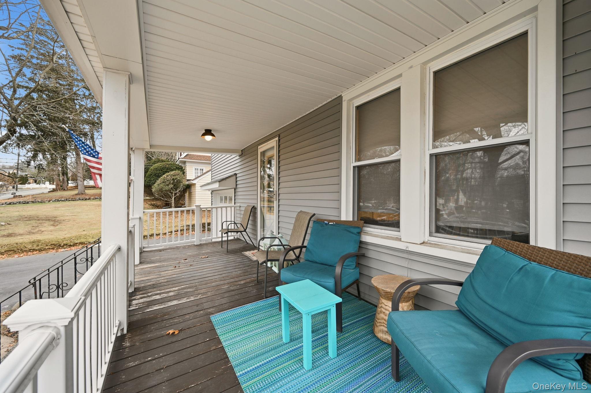 359 Orangeburg Road, Unit 2 Pearl River, NY 10965 - Photo 4 of 39 a balcony with furniture and wooden floor
