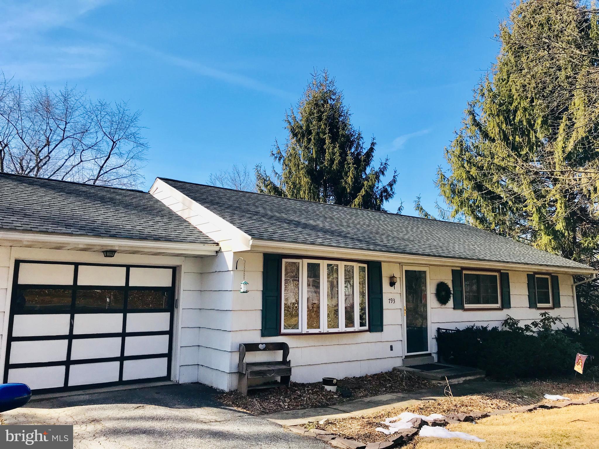 793 Mountain View Road Reading, PA 19607 - Photo 2 of 21 a front view of a house with a garage
