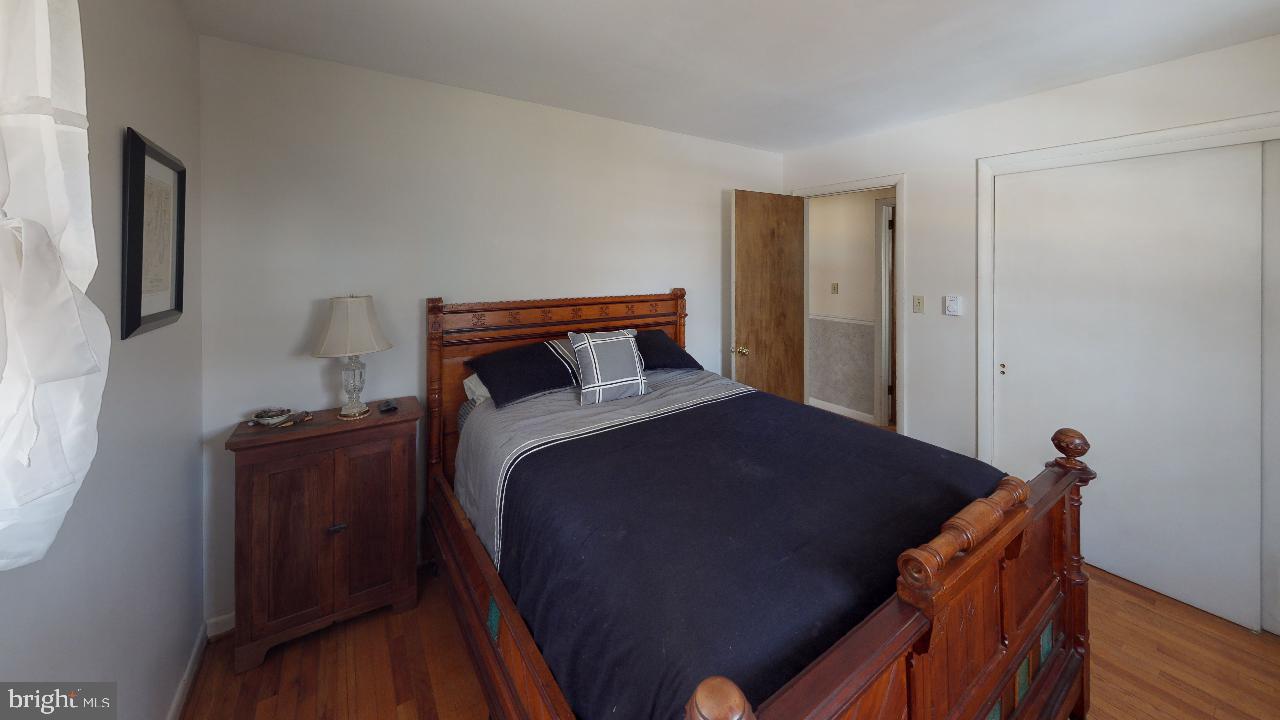 793 Mountain View Road Reading, PA 19607 - Photo 15 of 21 a bedroom with a bed and wooden floor