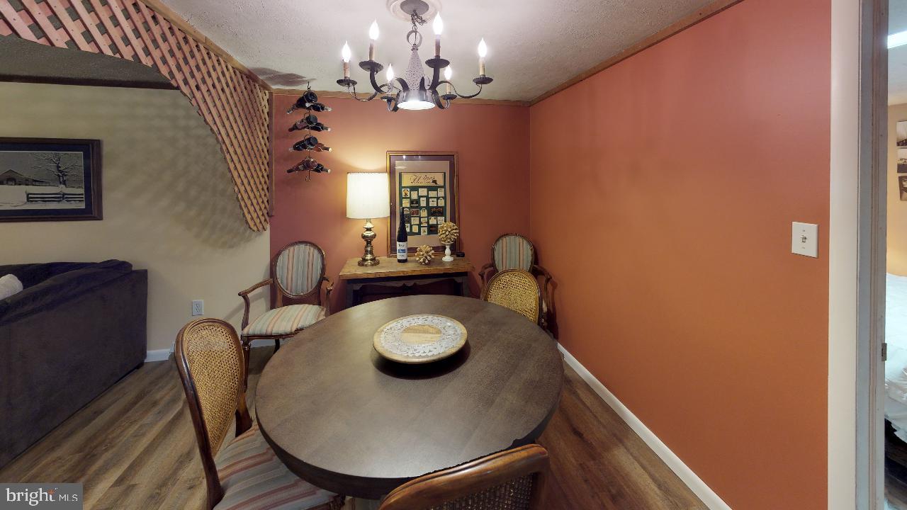 793 Mountain View Road Reading, PA 19607 - Photo 7 of 21 a view of a dining room with furniture and chandelier