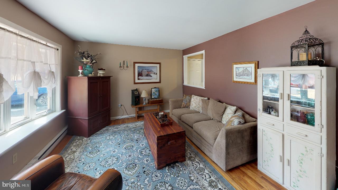 793 Mountain View Road Reading, PA 19607 - Photo 8 of 21 a living room with furniture and a window