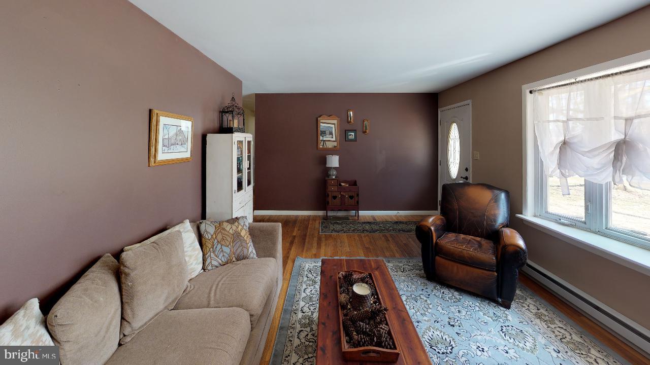 793 Mountain View Road Reading, PA 19607 - Photo 9 of 21 a living room with furniture and a large window