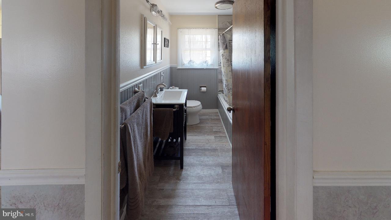 793 Mountain View Road Reading, PA 19607 - Photo 10 of 21 a view of a hallway with wooden floor