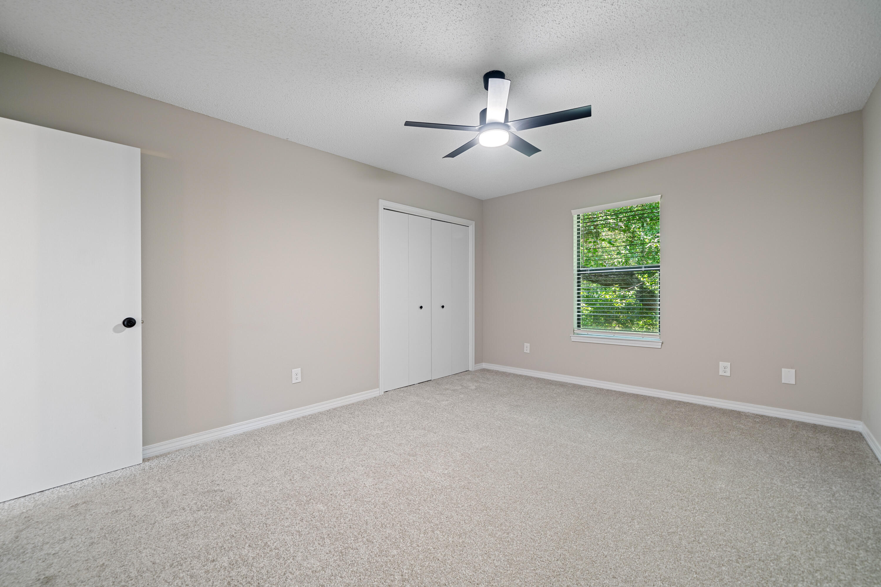 1681 Highway 98, Unit 3 Mary Esther, FL 32569 - Photo 12 of 21 a view of an empty room with a window