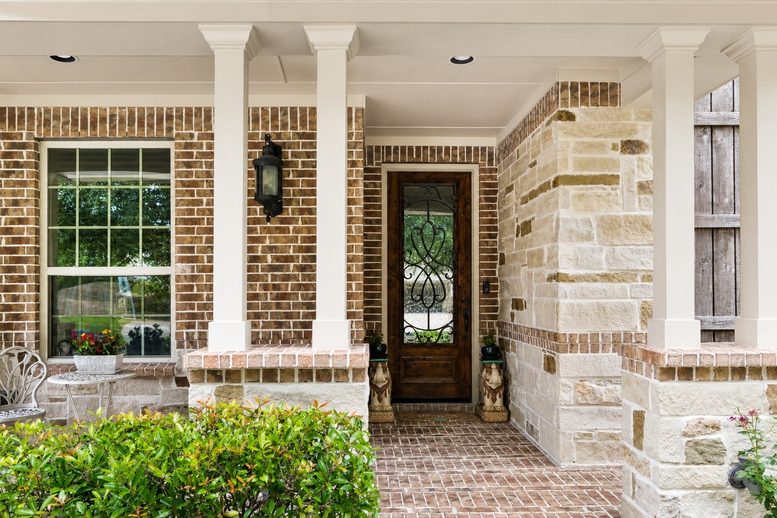 2326 Hamilton Pool Lane Friendswood, TX 77546 - Photo 4 of 49 a front view of a building with a garden