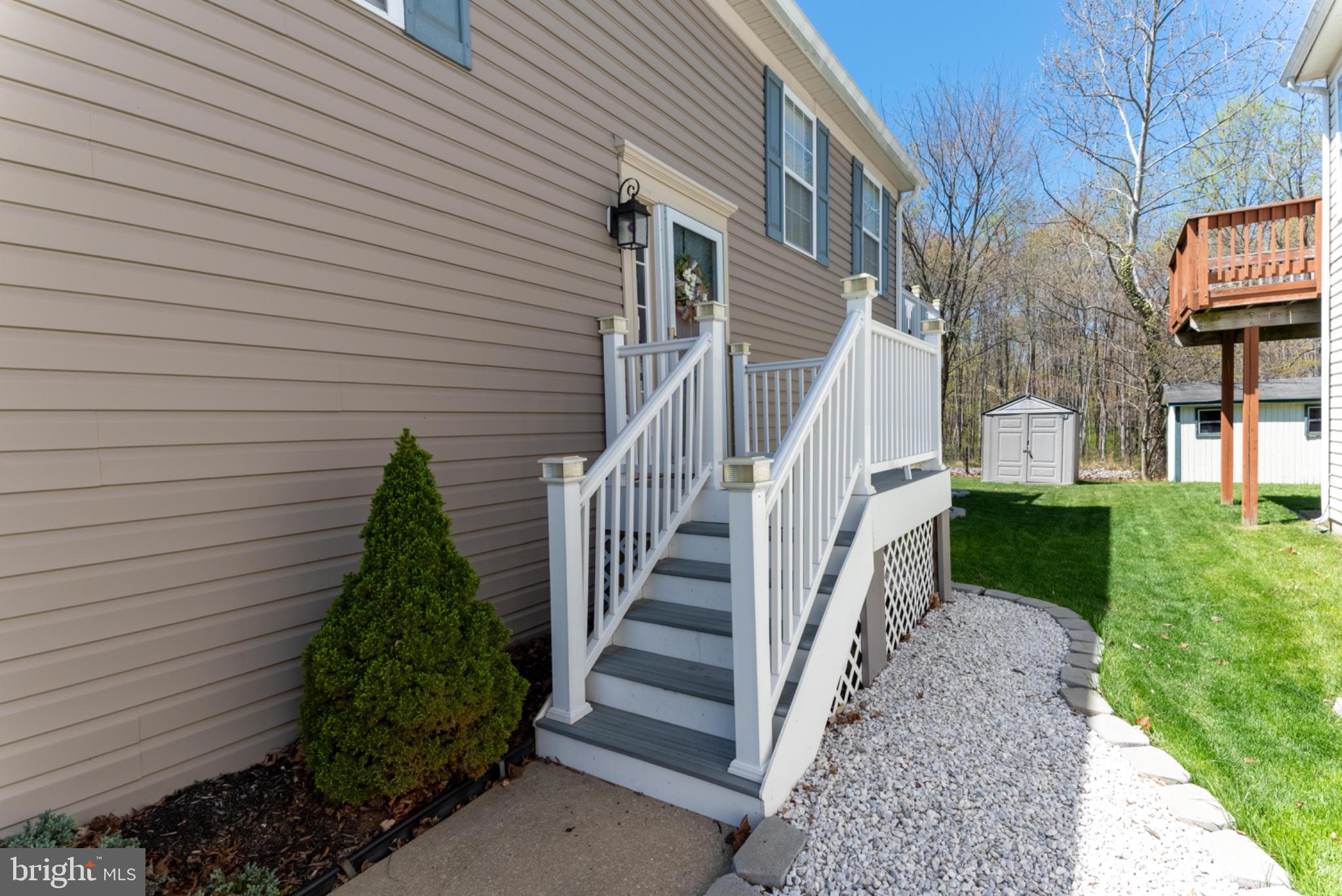 60 6 Point Court Baltimore, MD 21244 - Photo 2 of 28 a view of a pathway with a house