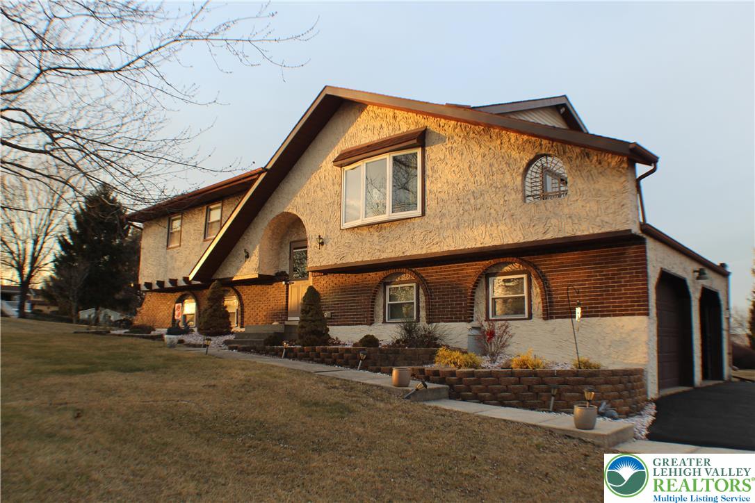 front view of a house with a street