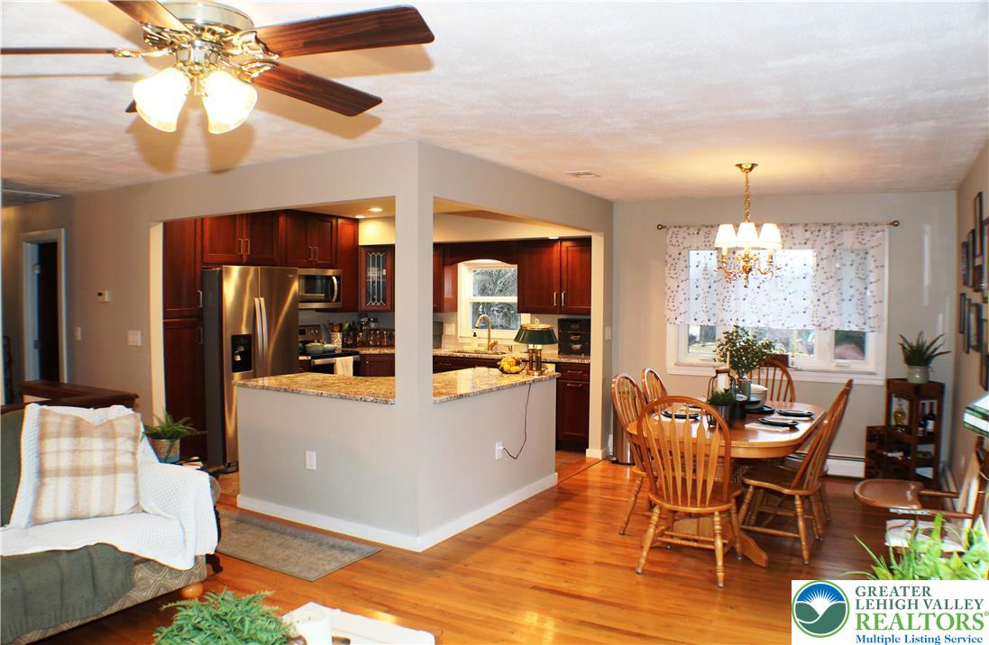 3604 Belfry Road Northampton, PA 18067 - Photo 12 of 44 a view of a dining room with furniture window and wooden floor