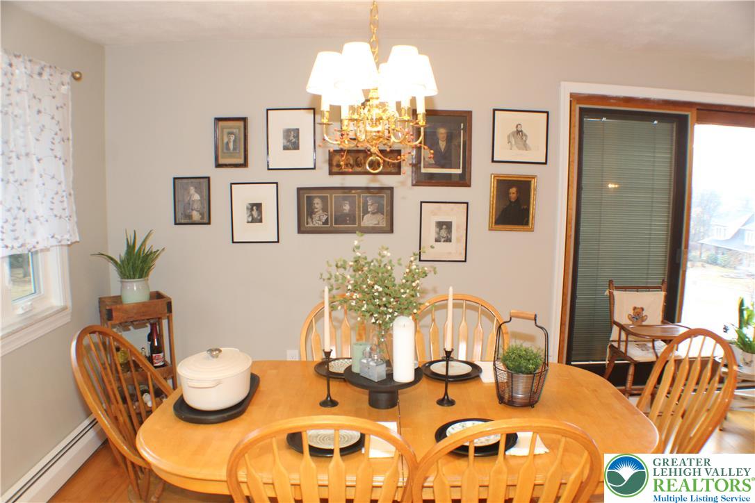 3604 Belfry Road Northampton, PA 18067 - Photo 17 of 44 a dining room with furniture and wooden floor