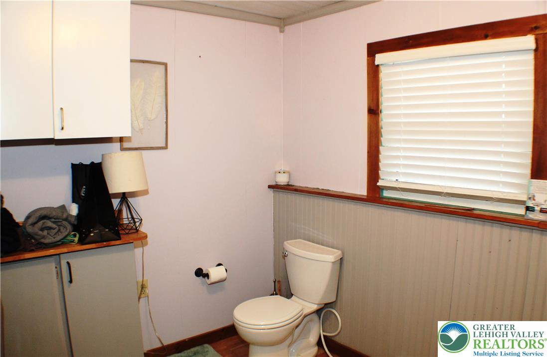 3604 Belfry Road Northampton, PA 18067 - Photo 40 of 44 a bathroom with a toilet a sink and a window