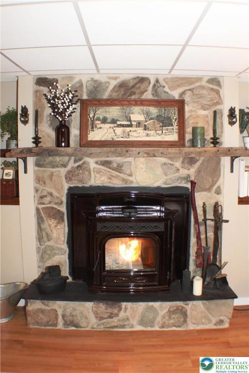 3604 Belfry Road Northampton, PA 18067 - Photo 42 of 44 a fireplace with a clock on top of it