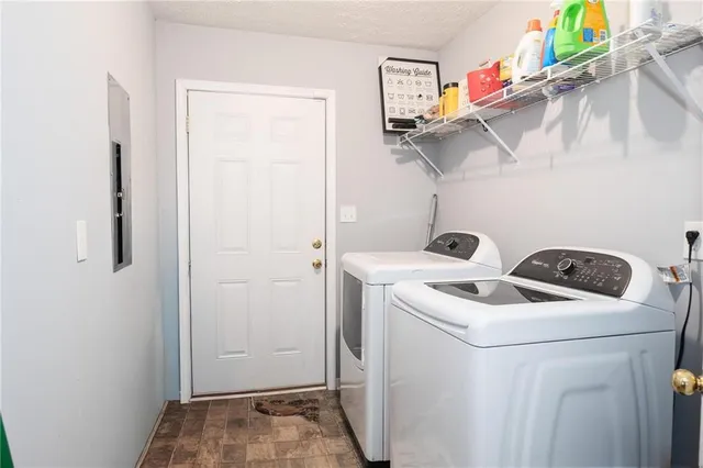 a view of a hallway with a white door