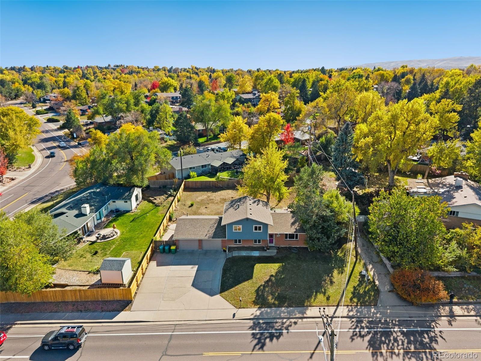11760 West 32nd Avenue Wheat Ridge, CO 80215 - Photo 27 of 28 an aerial view of residential houses with outdoor space