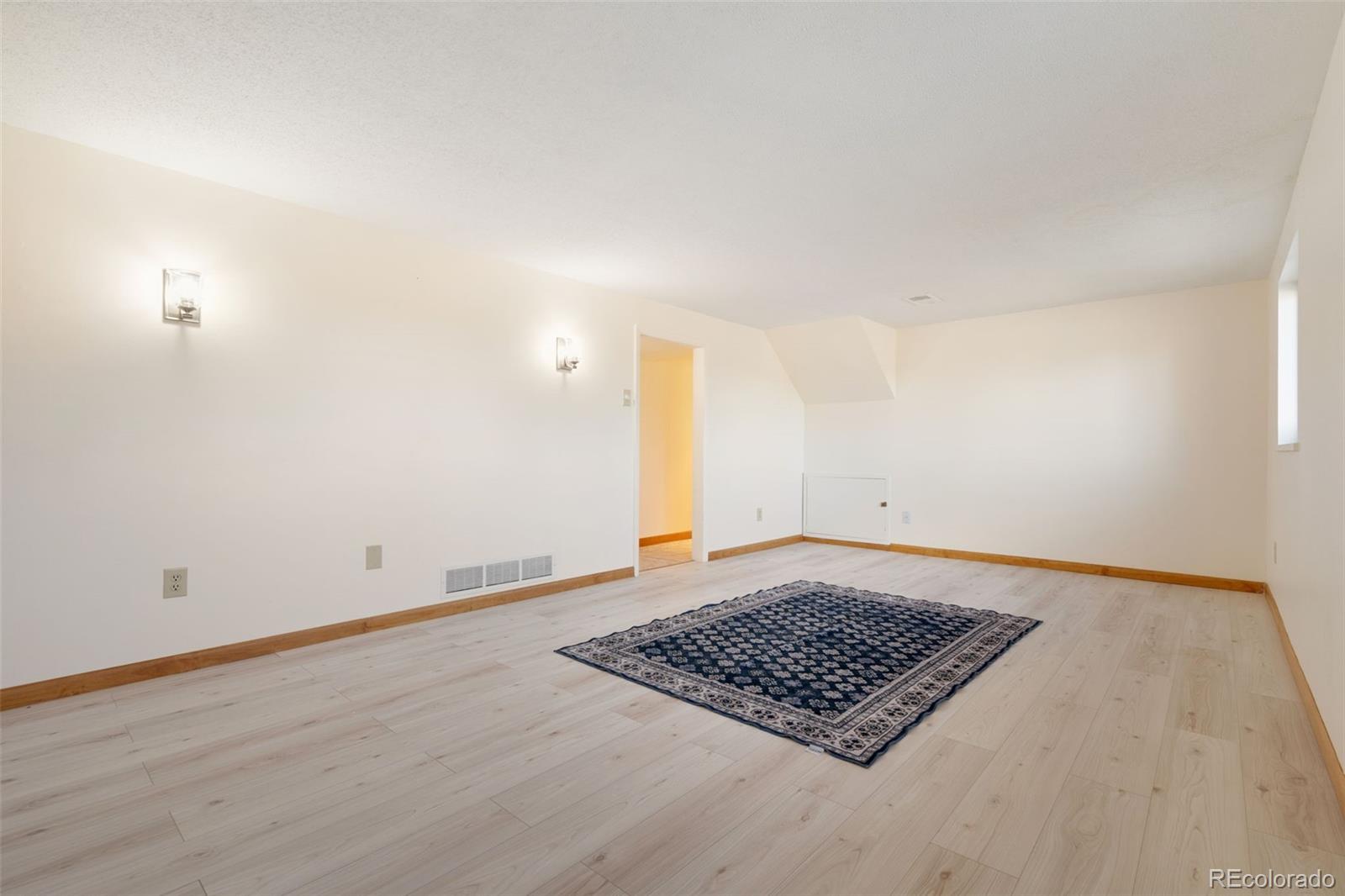 11760 West 32nd Avenue Wheat Ridge, CO 80215 - Photo 6 of 28 a view of an empty room and window