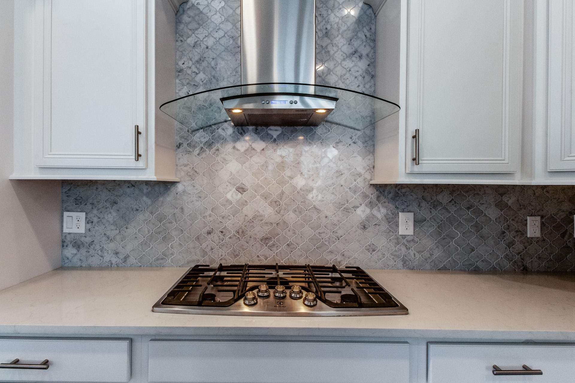 239 Milestone Drive, Unit 554A Inlet Beach, FL 32461 - Photo 8 of 36 a kitchen with a stove and a white cabinet
