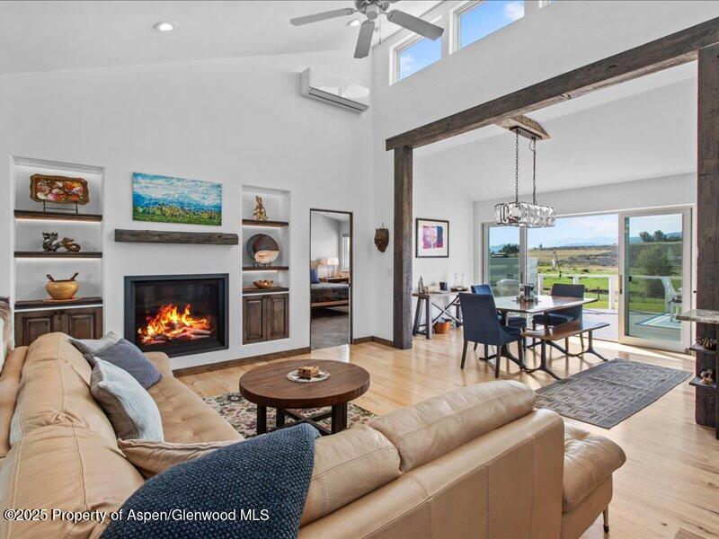 4100 County Road 103 Carbondale, CO 81623 - Photo 11 of 43 a living room with furniture and a fireplace