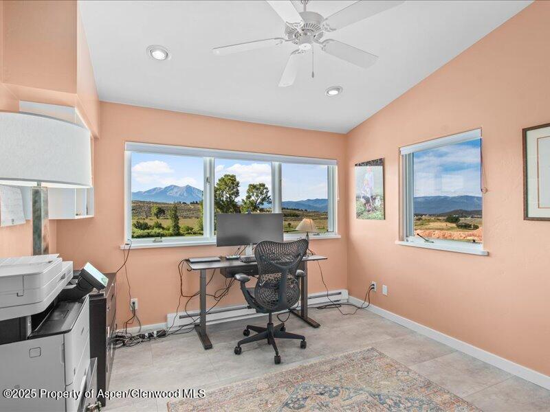 4100 County Road 103 Carbondale, CO 81623 - Photo 28 of 43 a workspace with wooden floor and a window