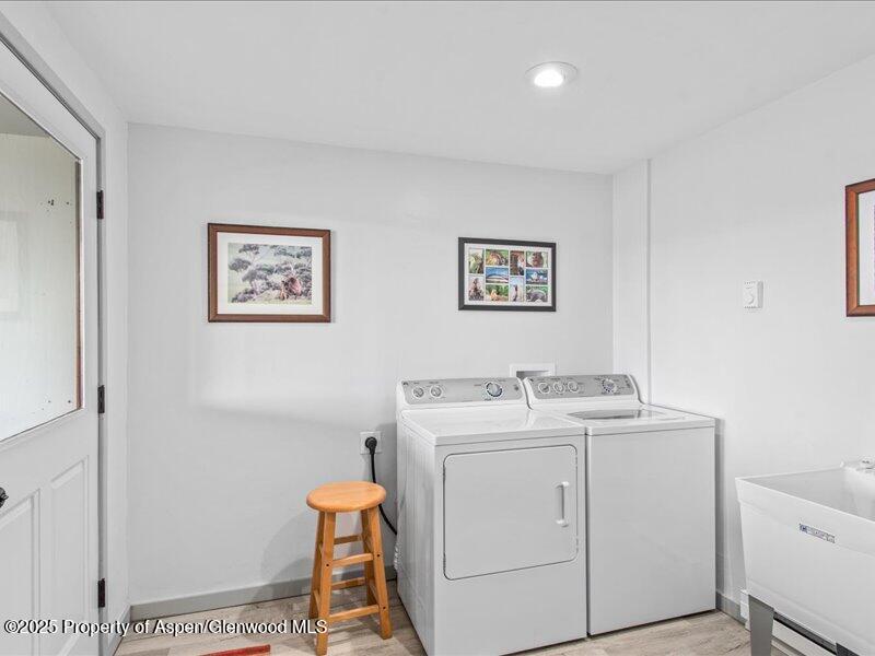4100 County Road 103 Carbondale, CO 81623 - Photo 36 of 43 a utility room with dryer and washer