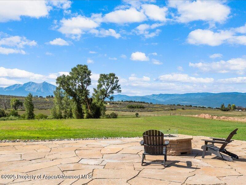 4100 County Road 103 Carbondale, CO 81623 - Photo 4 of 43 a view of a ocean with a table and chairs
