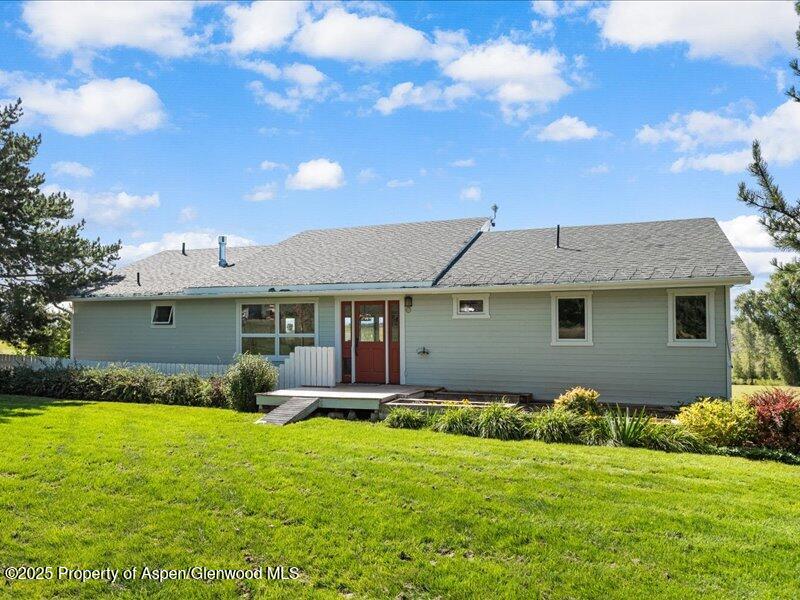 4100 County Road 103 Carbondale, CO 81623 - Photo 41 of 43 a front view of a house with garden