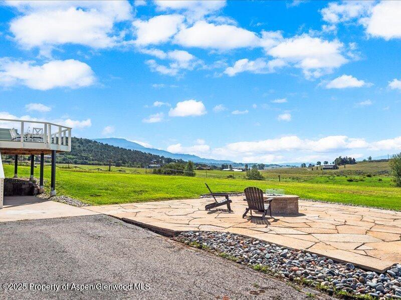 4100 County Road 103 Carbondale, CO 81623 - Photo 7 of 43 a view of a terrace with a big yard