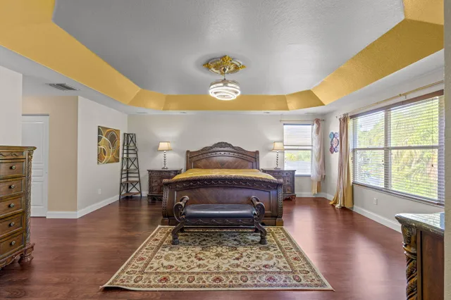 a living room with furniture rug and window