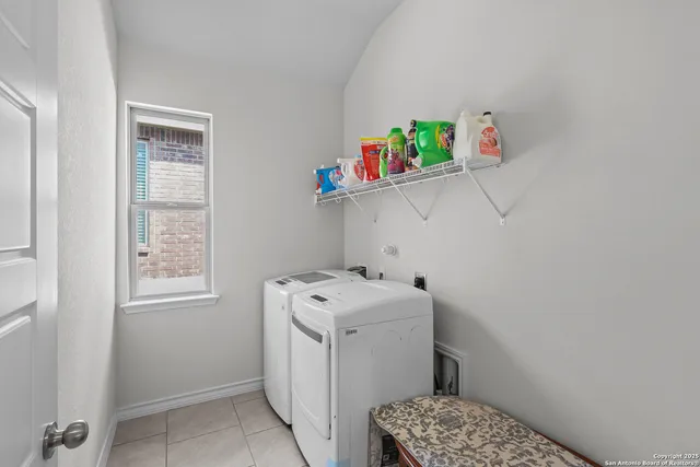 a utility room with dryer and washer
