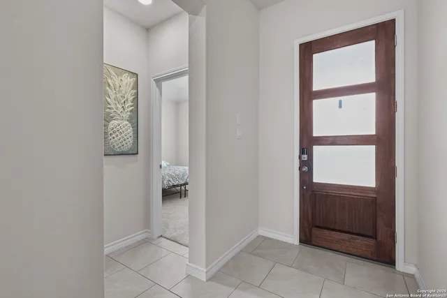 a view of an entryway with hallway