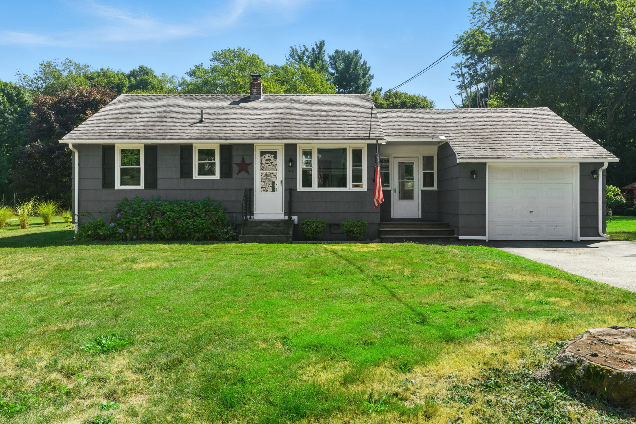 145 River Street Plainfield, CT 06354 - Photo 1 of 1 a view of a house with a garden