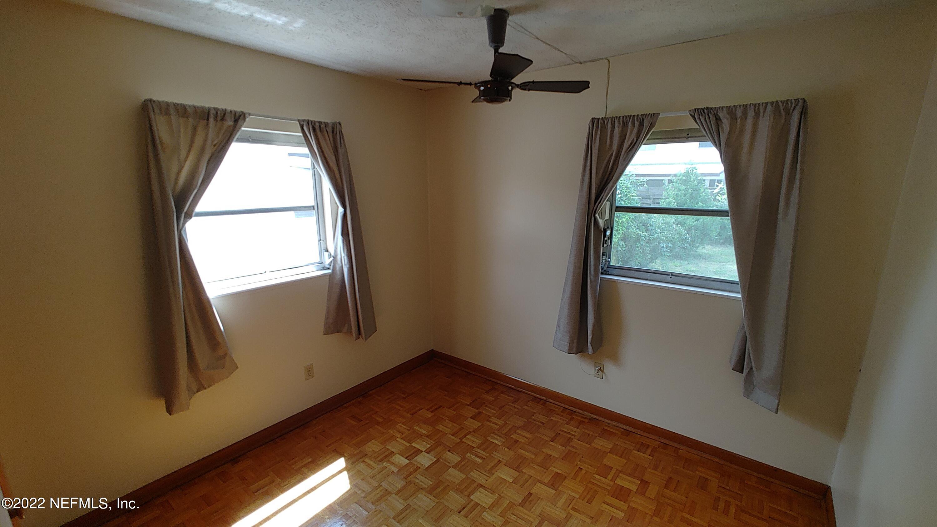 8280 Barracuda Road Jacksonville, FL 32244 - Photo 9 of 13 a view of empty room with window