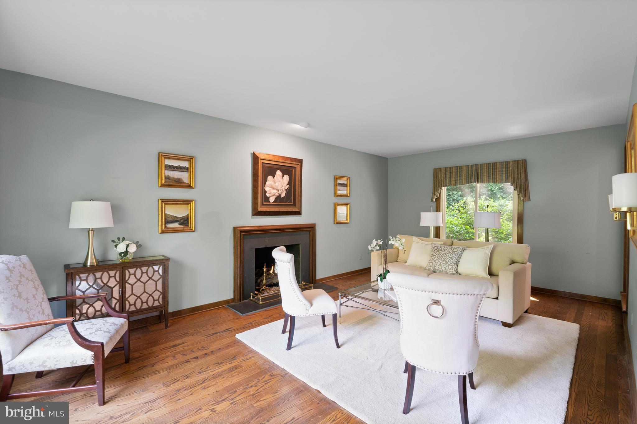 650 Strafford Circle Wayne, PA 19087 - Photo 7 of 45 Living room with fireplace