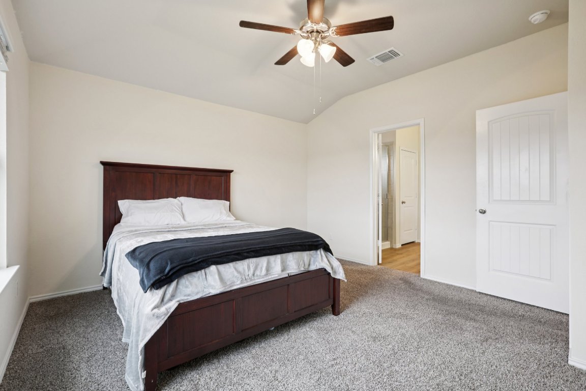 117 Break Avenue Taylor, TX 76574 - Photo 33 of 40 a bedroom with a bed and window