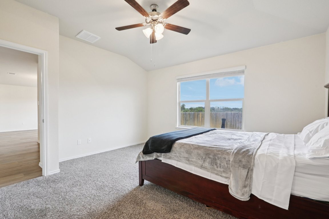 117 Break Avenue Taylor, TX 76574 - Photo 35 of 40 a bedroom with a bed and window